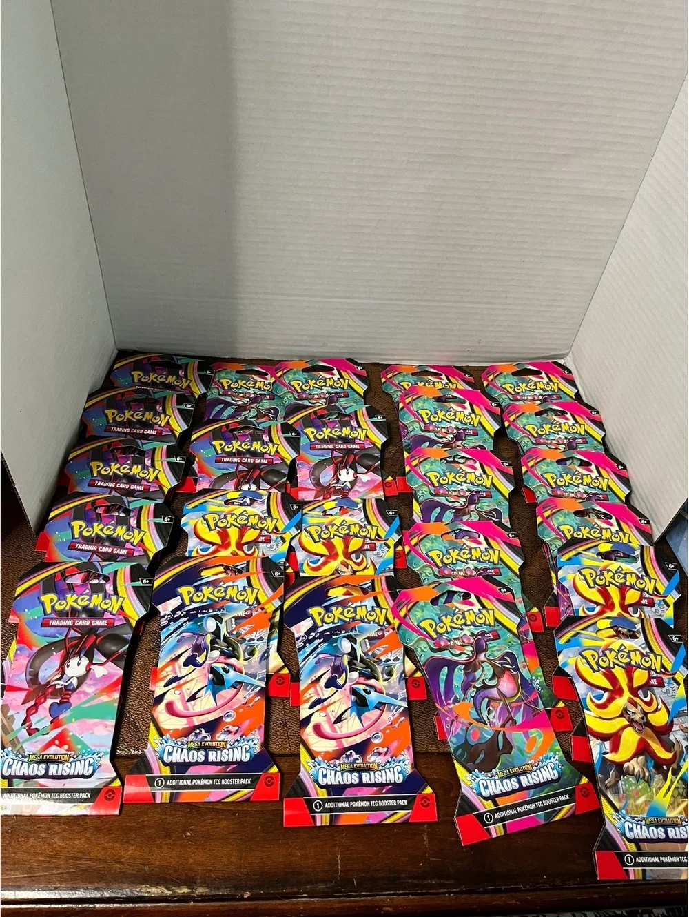LOT of 24: 2026 Pokémon TCG: Mega Evolution Chaos Rising Booster Packs